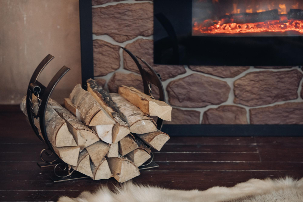 Pose de poêle bois par Jérôme Dépannage Artisan installant un poêle de chauffage à bois